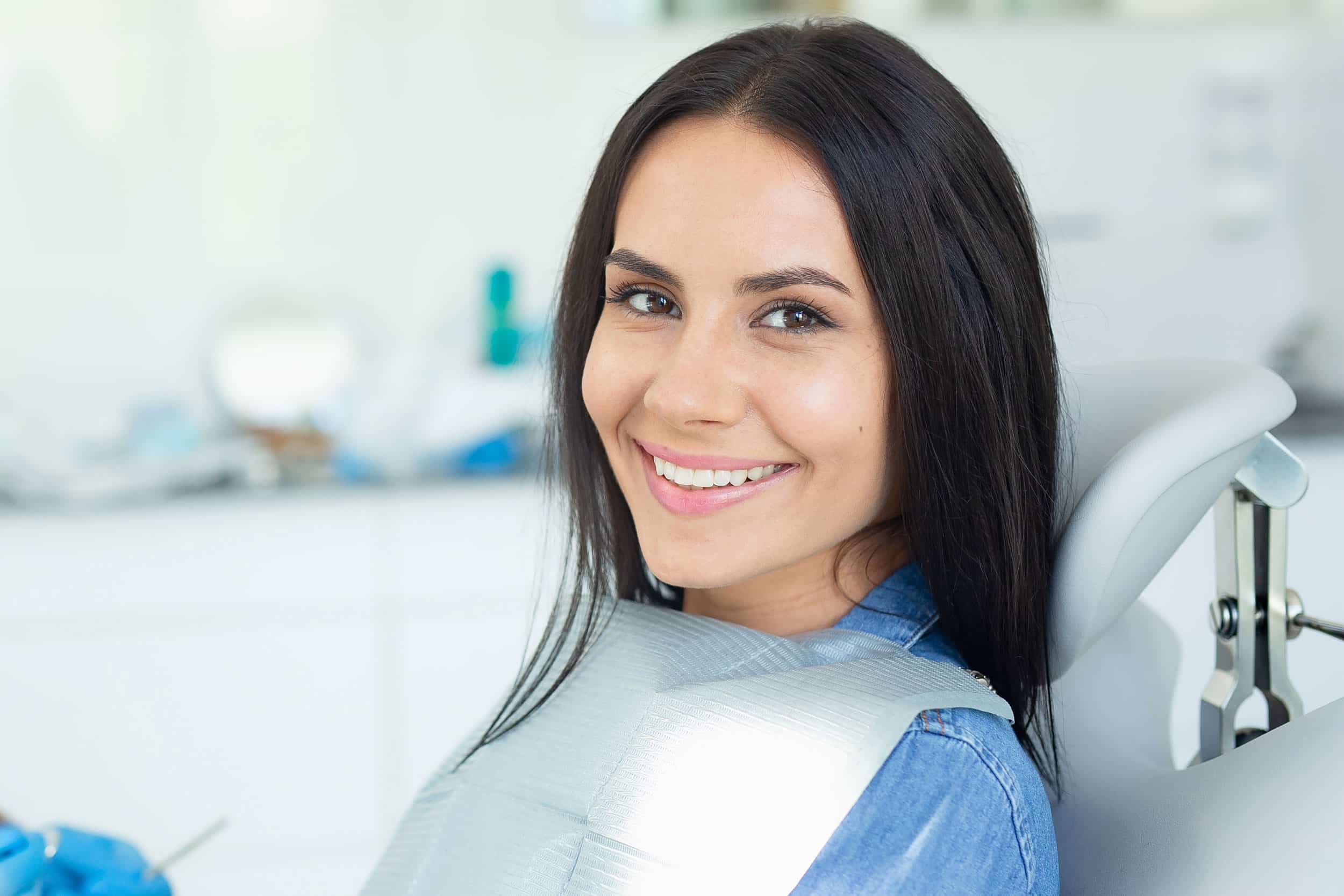 Smiling Woman Finds Relief After Oral Surgery Orthodontics in Lubbock