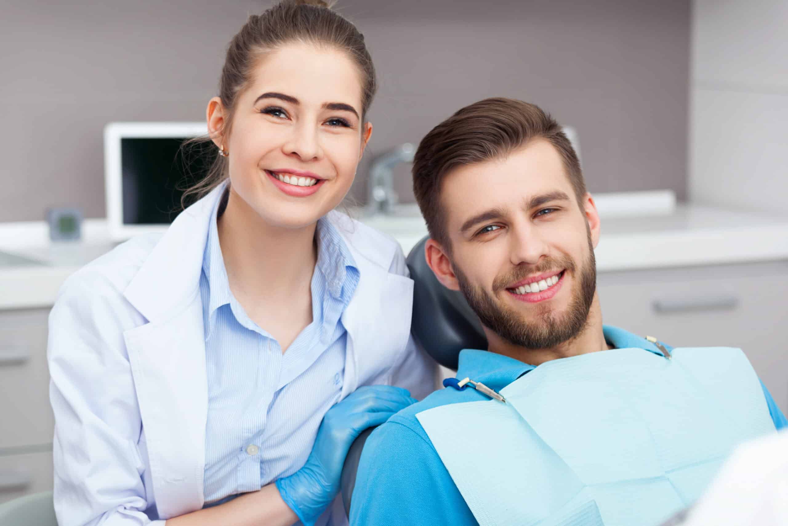 Portrait of a smiling female dentist at a dental clinic in Lubbock, representing the best dental care in the area.